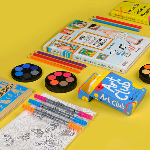 Yellow background, Childrens products laid out: How to draw Book Paints Art Clubs Cards to Spark Creativity, Why is Art Full of Naked People? & Other Vital Questions About Art Book 