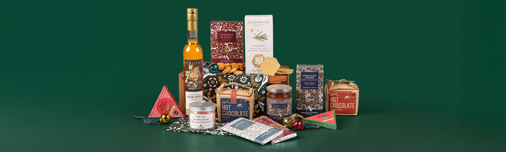 A selection of Festive foods including hot chocolate, chutneys, biscuits, liqueur and chocolate bars.