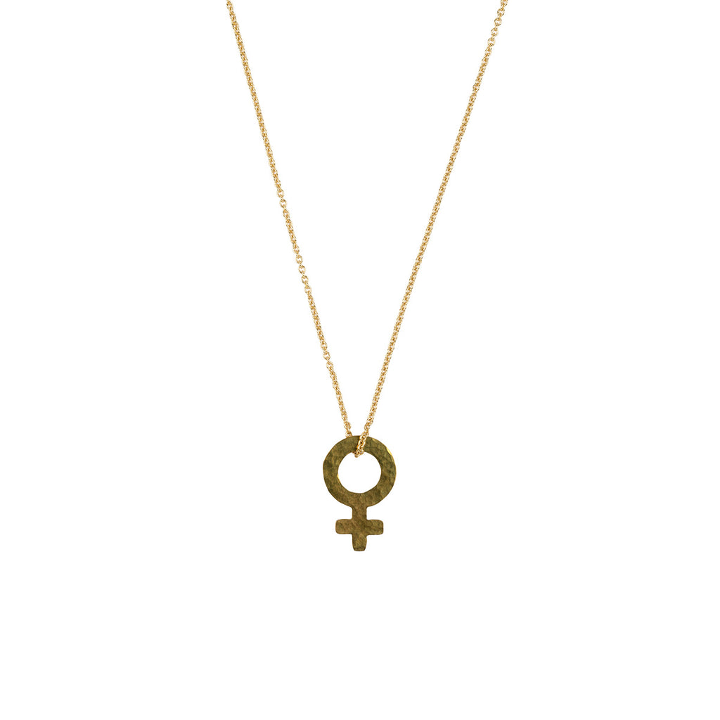 A gold chain necklace featuring a hammered-texture gold pendant in the shape of the female gender symbol, shown against a plain white background.