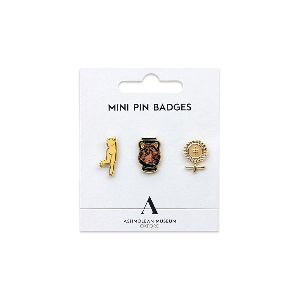 Set of 3 mini pin badges featuring one Greek pot, one nude torso sculpture and one Cypriot Ankh female symbol design against a white card background with black 'ASHMOLEAN MUSEUM OXFORD' text and 'A' logo. 