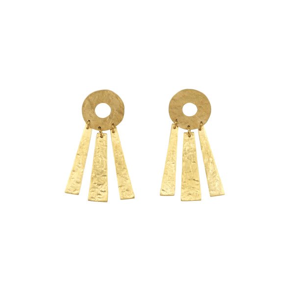 A pair of gold-toned statement dangle earrings featuring a textured circular disc with three hanging hammered rectangular bars, shown on a plain white background.