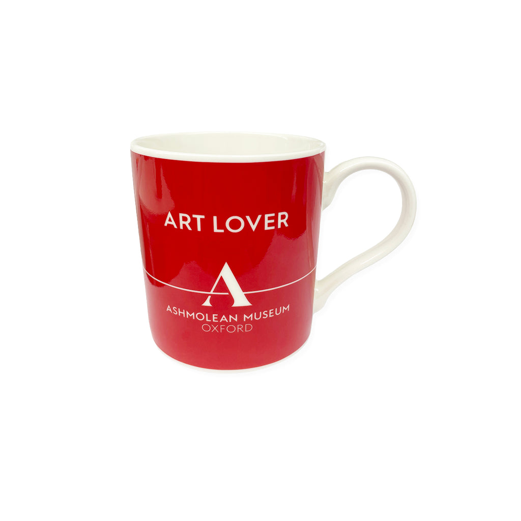 Red and white ceramic mug with ART LOVER and Ashmolean Museum Oxford text on a white background.