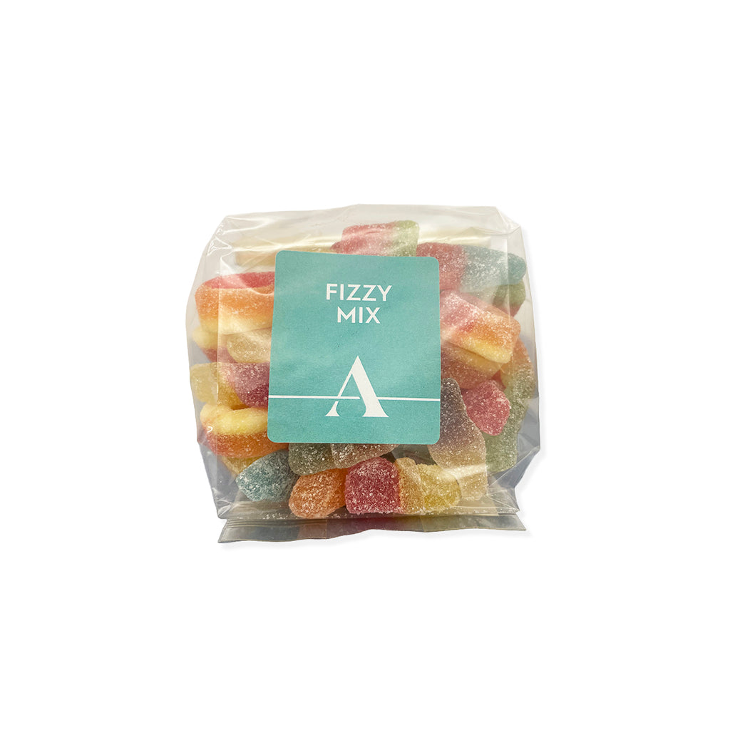 A clear plastic bag of colorful gummy candies with a teal label reading 'FIZZY MIX' and a large letter A, shown on a plain white background.