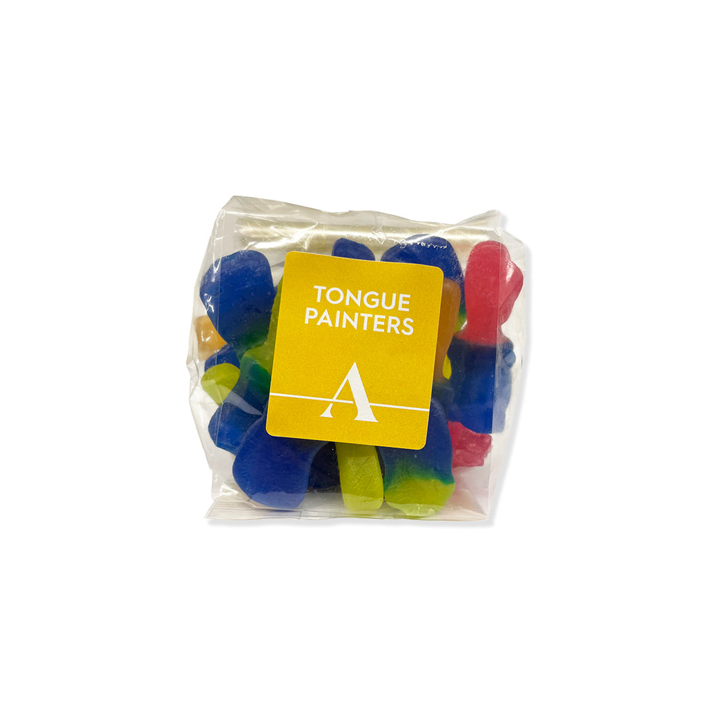 A clear plastic bag containing multiple small colorful tongue-shaped items, with a yellow label reading 'TONGUE PAINTERS' and a white stylized 'A' logo, on a white background.