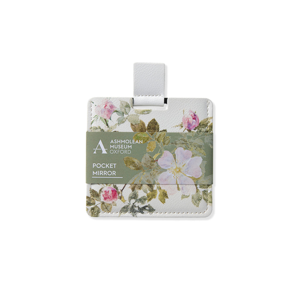 Pink floral pocket mirror with rose artwork on a white background.