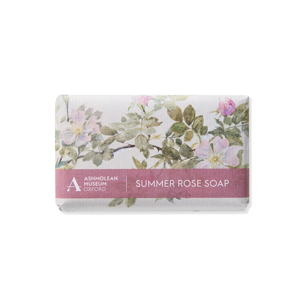 Bar of soap with floral design and 'Summer Rose Soap' text on a white background