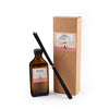 Peony Reed Diffuser set with bottle, sticks, and cardboard box on a white background