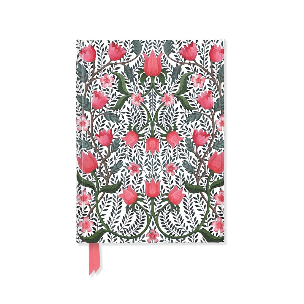 Floral patterned notebook with pink ribbon on a white background