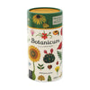  cylindrical packaging of Botanicum puzzle with botanical illustrations on a white background
