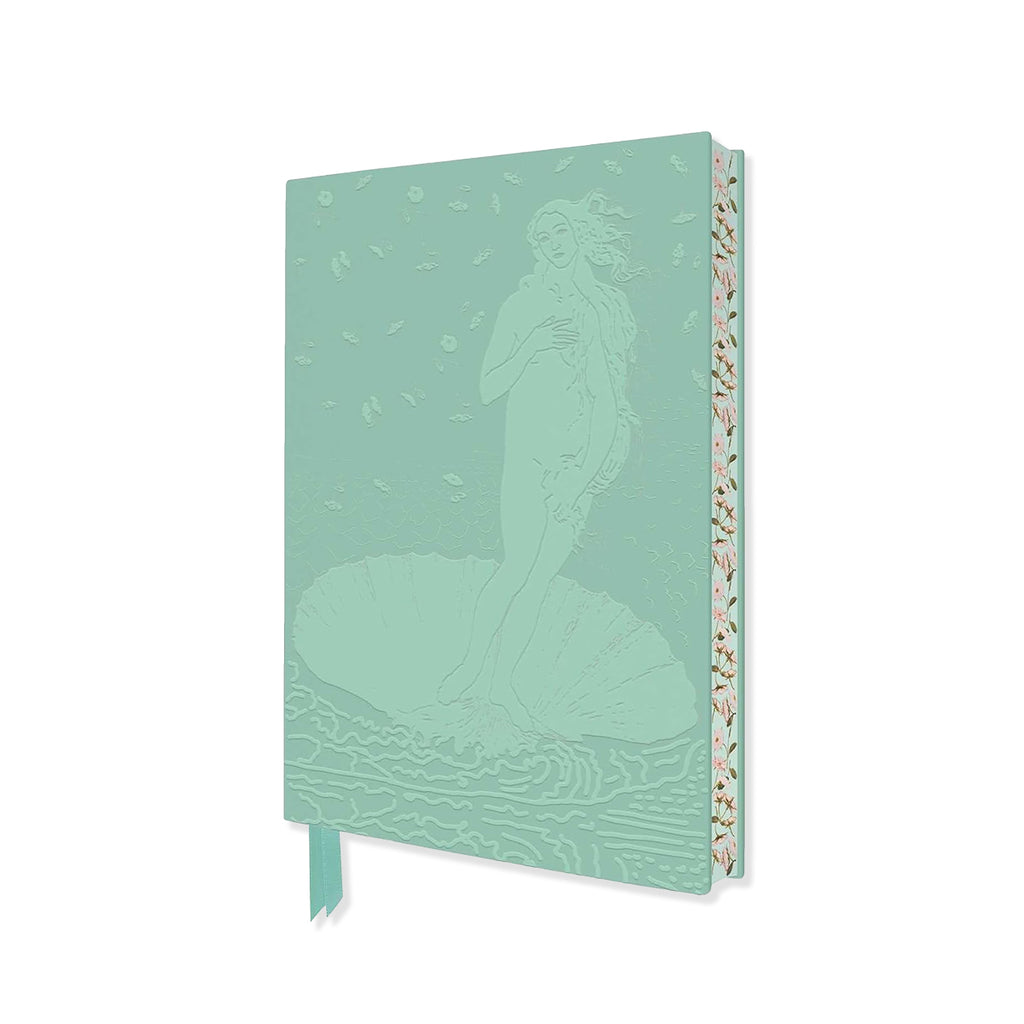 A mint green hardcover notebook featuring an embossed goddess Venus design on the cover and a delicate floral pattern on the spine, with a matching ribbon bookmark hanging from the bottom.