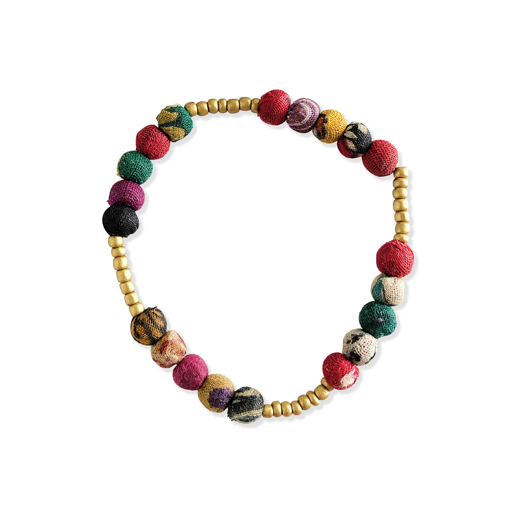 Colourful beaded bracelet on a white background