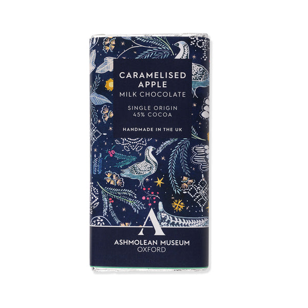 Caramelised apple milk chocolate bar with decorative navy blue packaging featuring the Ashmolean Museum logo.