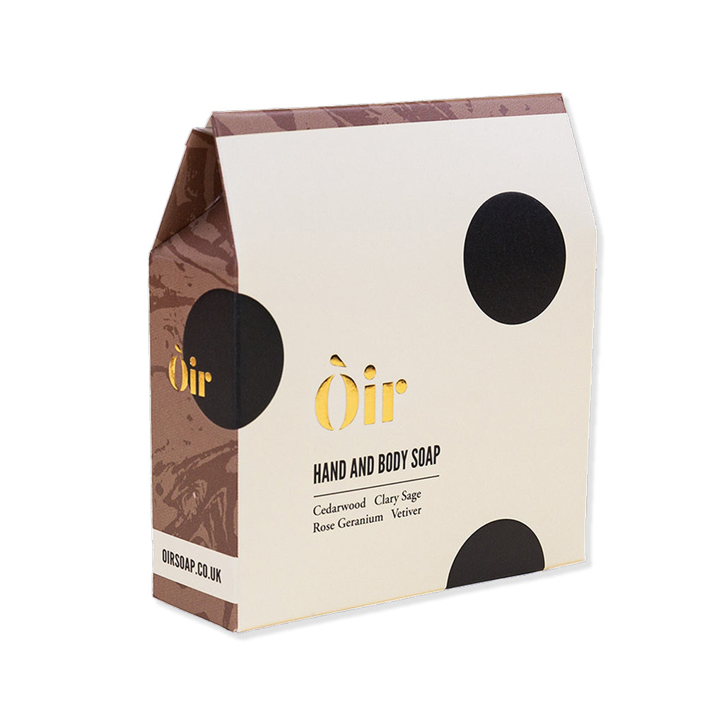 Oir hand and body soap packaging with brown and beige design