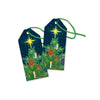 Two Christmas present gift tags with green string and art design of a Christmas tree and star on a navy background 