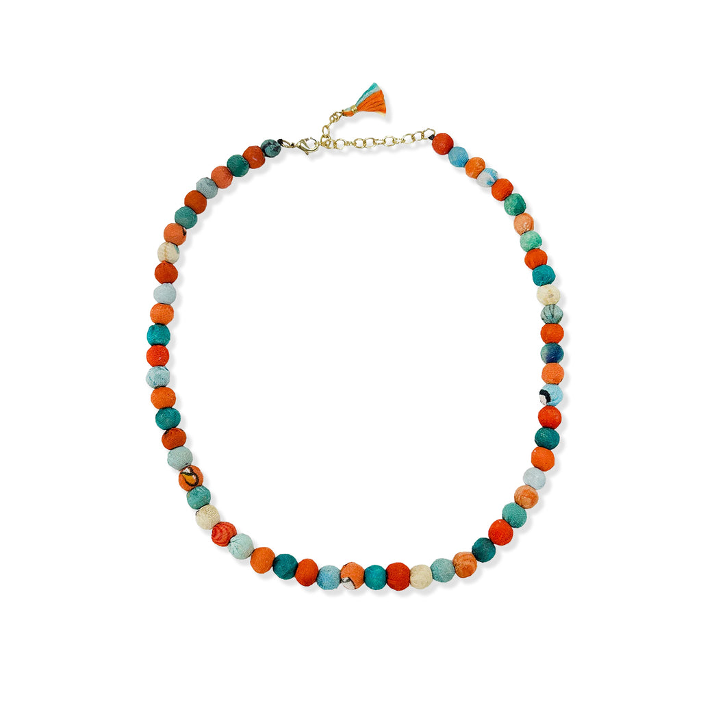 Colorful beaded necklace on a white background
