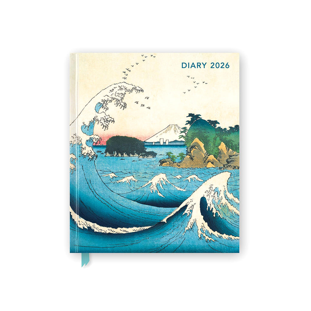 Breaking wave with mount fuji in the background