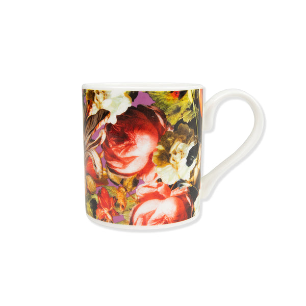 China mug with floral Dutch still life painting print on a white background.