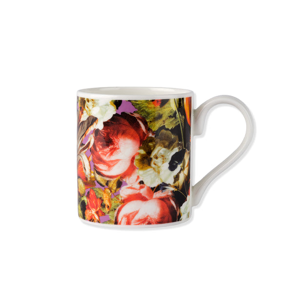 China mug with floral Dutch still life painting print on a white background.