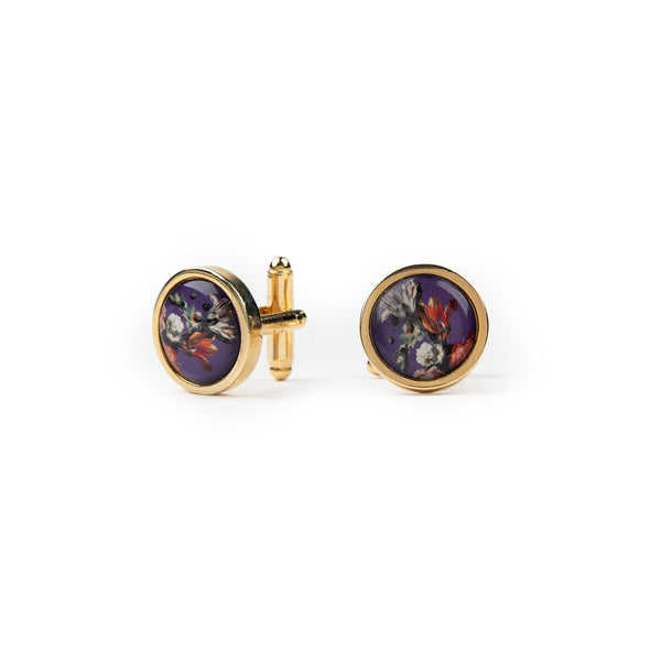 Pair of floral purple cufflinks on a white background