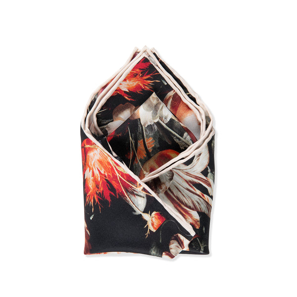 Folded fabric with a floral pattern on a white background