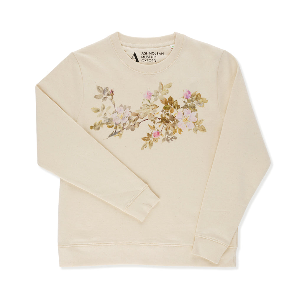 White ecru sweatshirt with floral design worn  on a white background