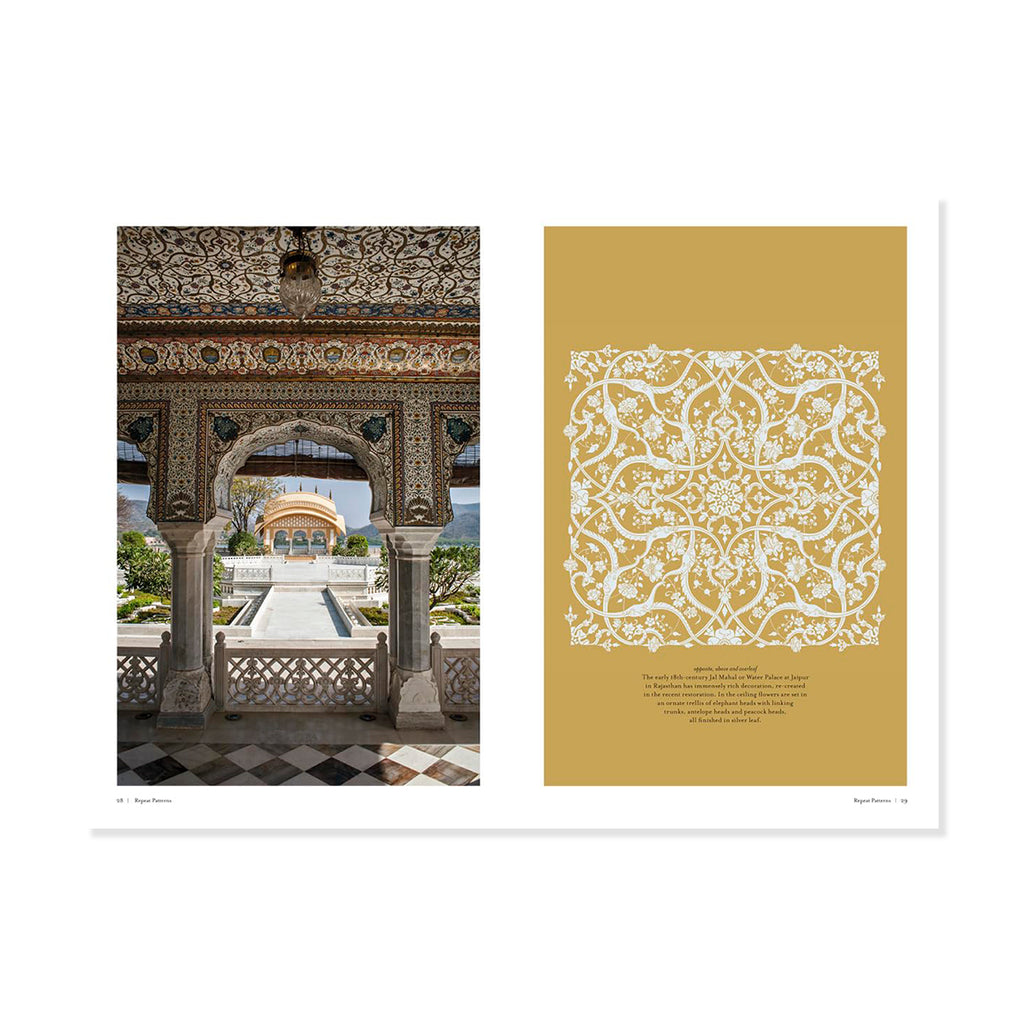 Indian decorative archway with intricate patterns and a gold background with white pattern.