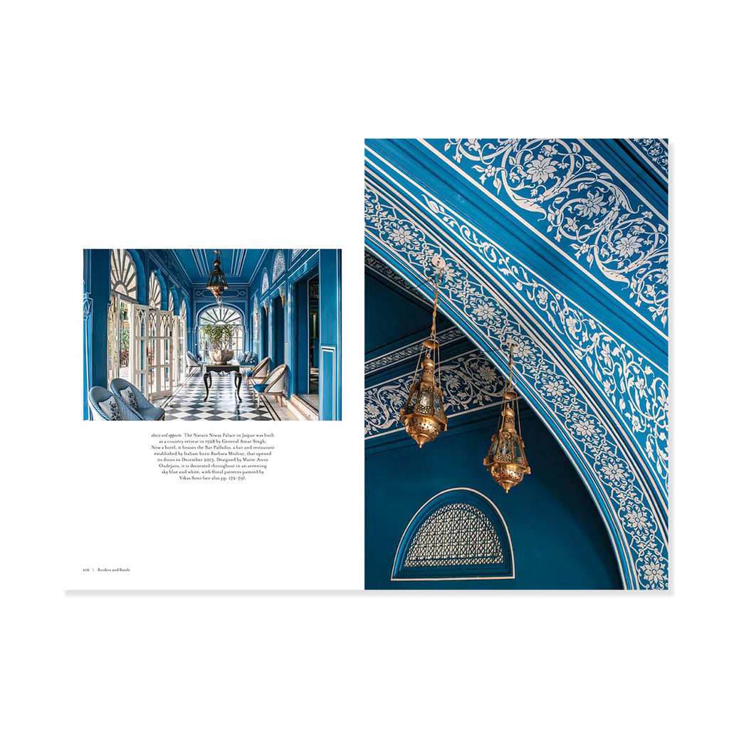 Page insert of Indian bright blue hallway and ornate white floral designs on the ceiling.
