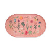 Pink scalloped edged enamel tray with delicate multicolour country flowers printed pattern on a white background.