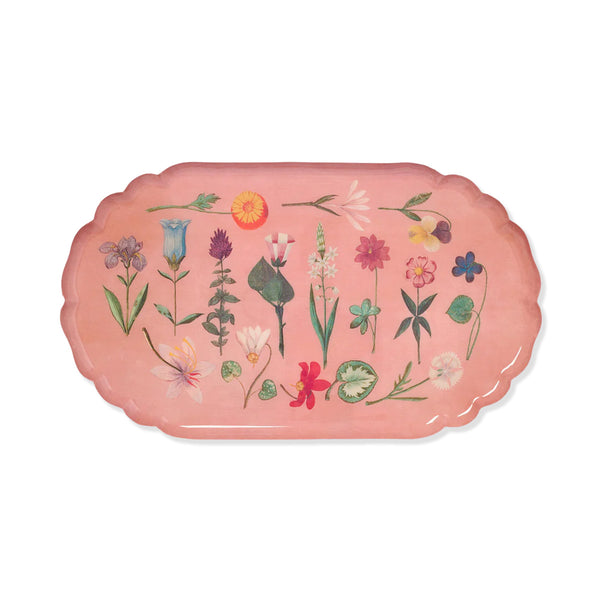Pink scalloped edged enamel tray with delicate multicolour country flowers printed pattern on a white background.