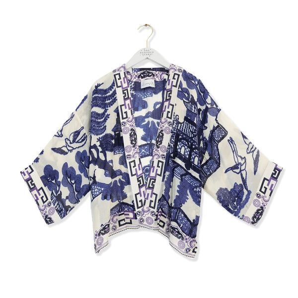 Blue and white patterned kimono on a white background.