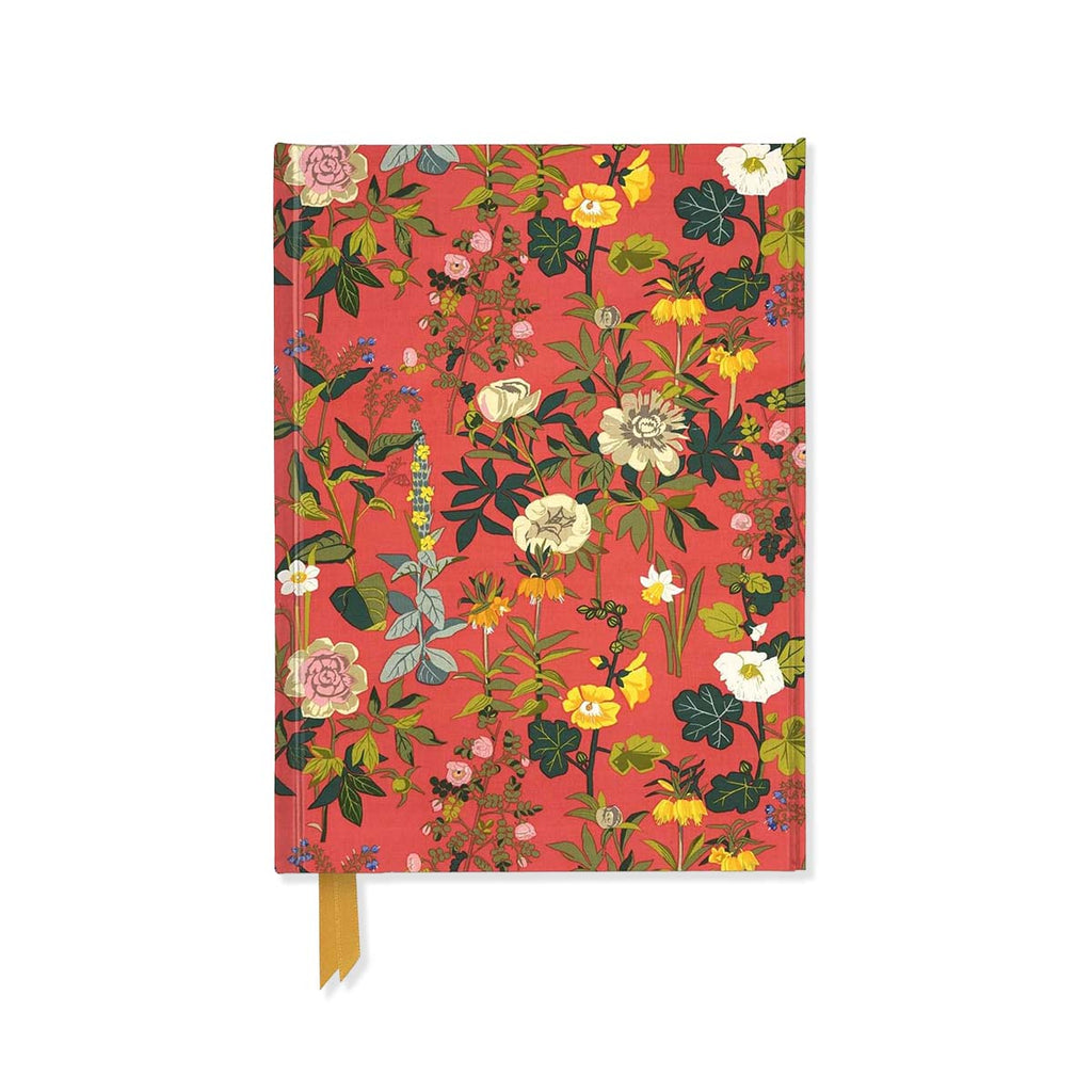 Floral-patterned notebook with a red background on a white background