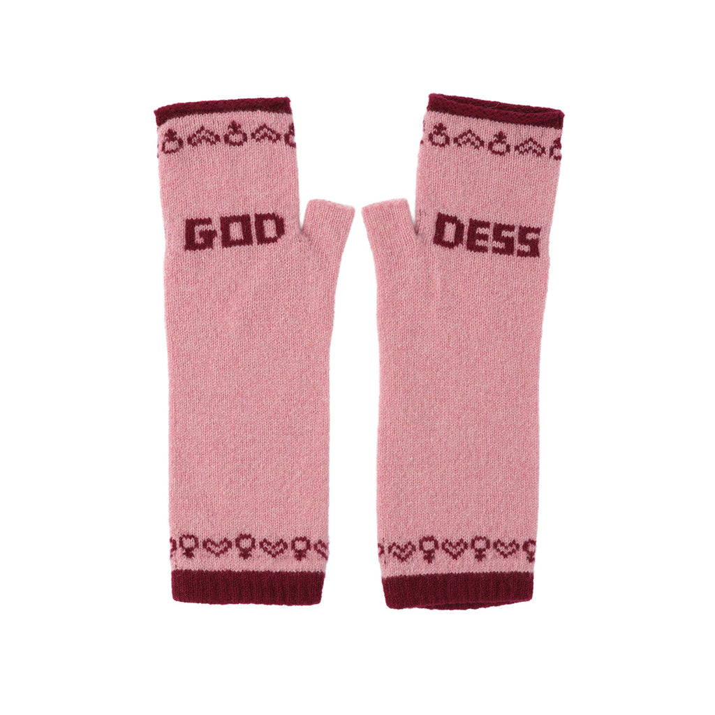 A pair of pink knit fingerless gloves with dark burgundy accents, featuring the word 'GOD' on one glove and 'DESS' on the other, along with heart and cup motifs, set against a plain white background.