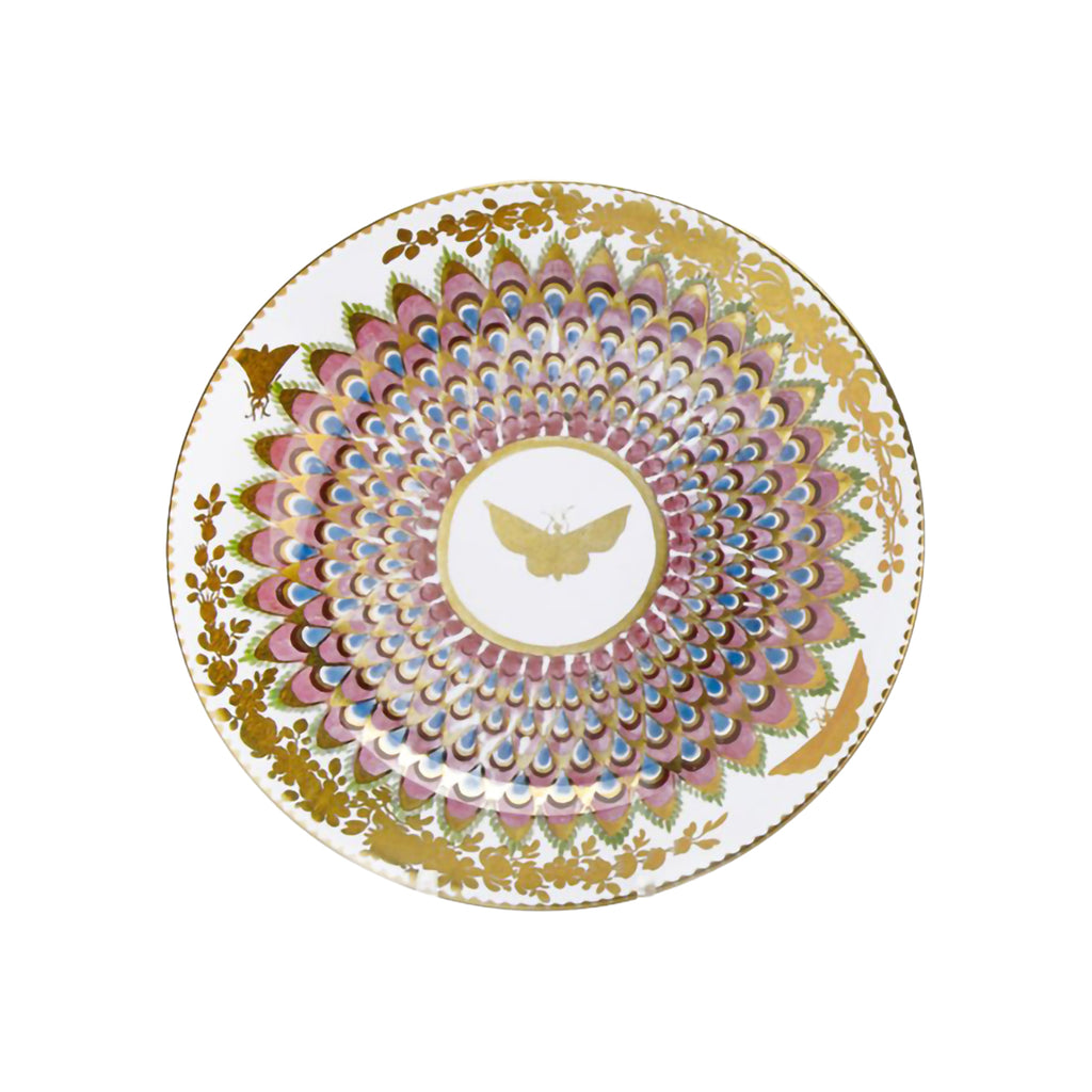 Ornate tin plate with golden butterflies and leaves with pink and blue patterns on a white background.