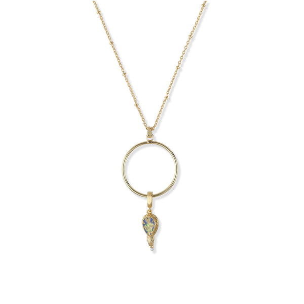 Gold necklace with a circular pendant and teardrop-shaped charm on a white background