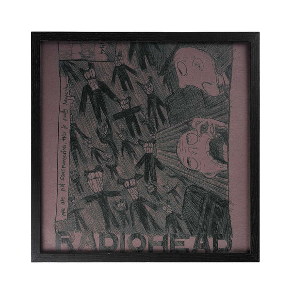 Framed grey Radiohead graphic t shirt with abstract design and text on a white background