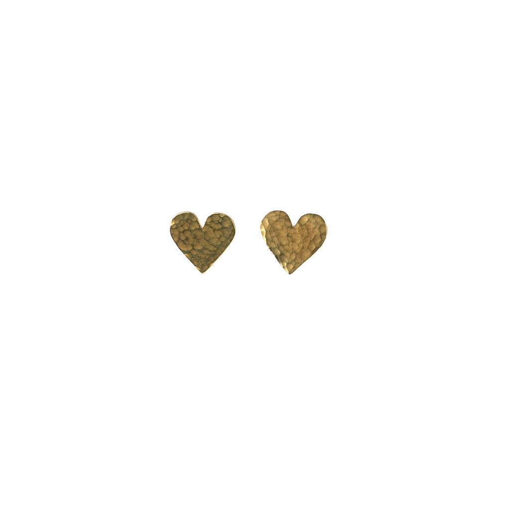 A pair of small textured gold heart-shaped stud earrings on a plain white background.