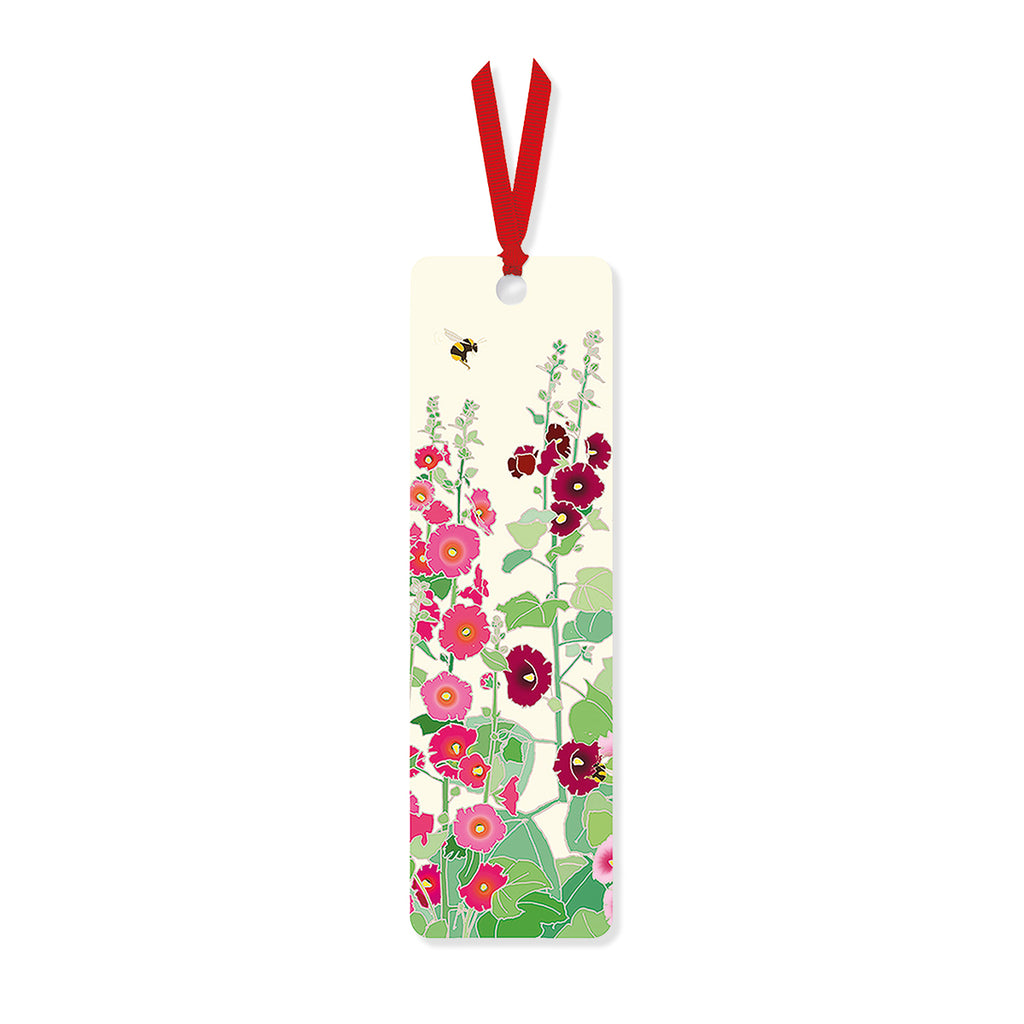 Floral print paper bookmark with red ribbon on a white background.