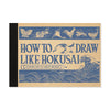 A book or booklet cover titled "HOW TO DRAW LIKE HOKUSAI: LESSONS FROM THE GREAT MASTER" with blue illustrated wave and animal drawings on a tan background, shown against a white background.