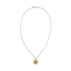 Gold necklace with a floral pendant on a white background