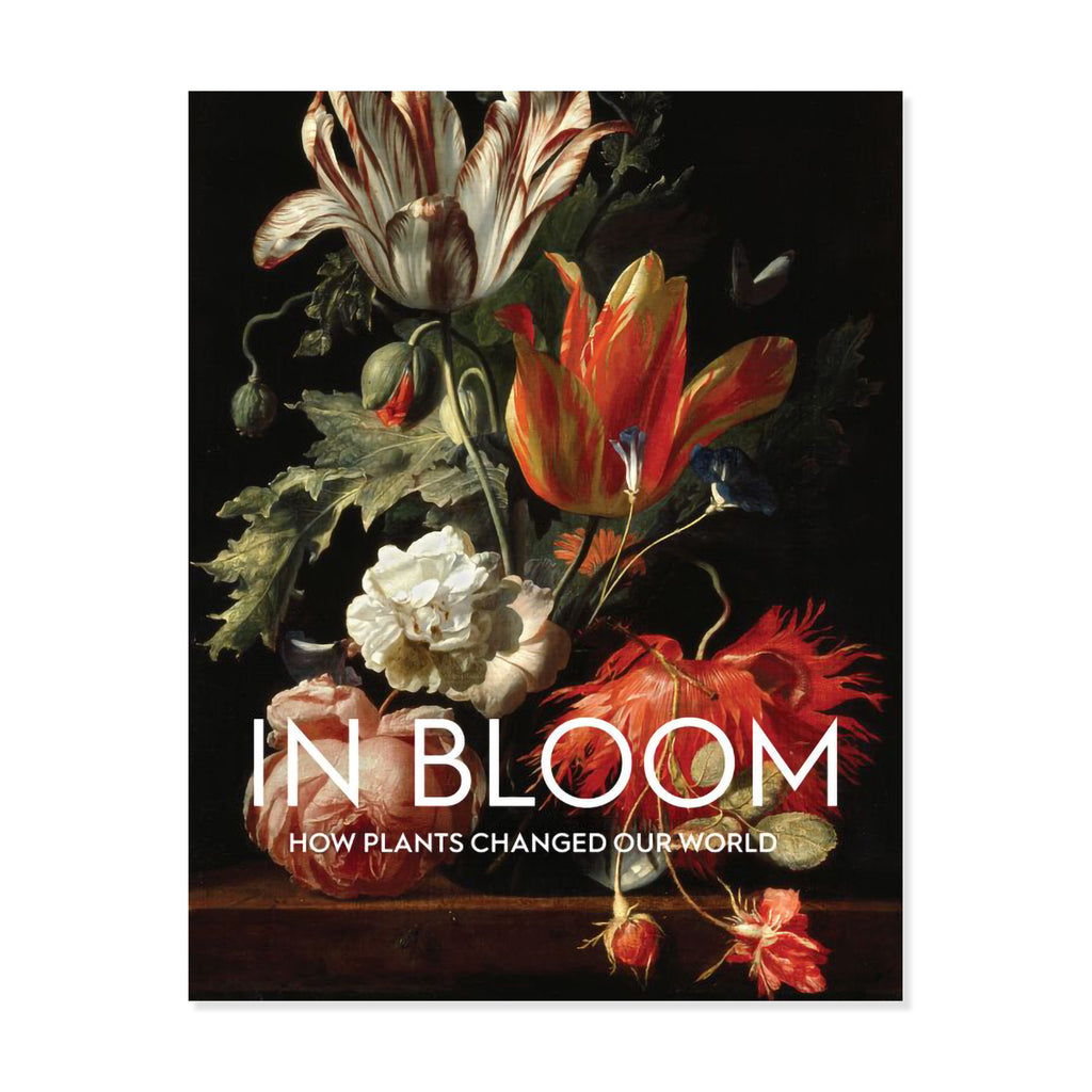 Catalogue book cover with Dutch still life painting of colourful blooming pink red and white flowers with the text 'IN BLOOM HOW PLANTS CHANGED OUR WORLD' in all capitals on a dark black background. 