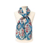 Scarf with floral pattern on a mannequin against a white background