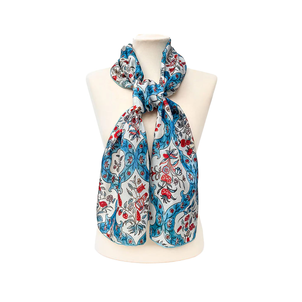 Scarf with floral pattern on a mannequin against a white background