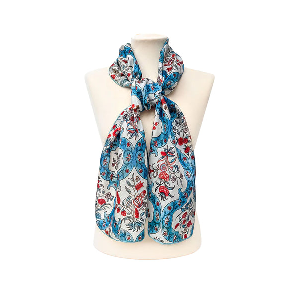 Scarf with floral pattern on a mannequin against a white background