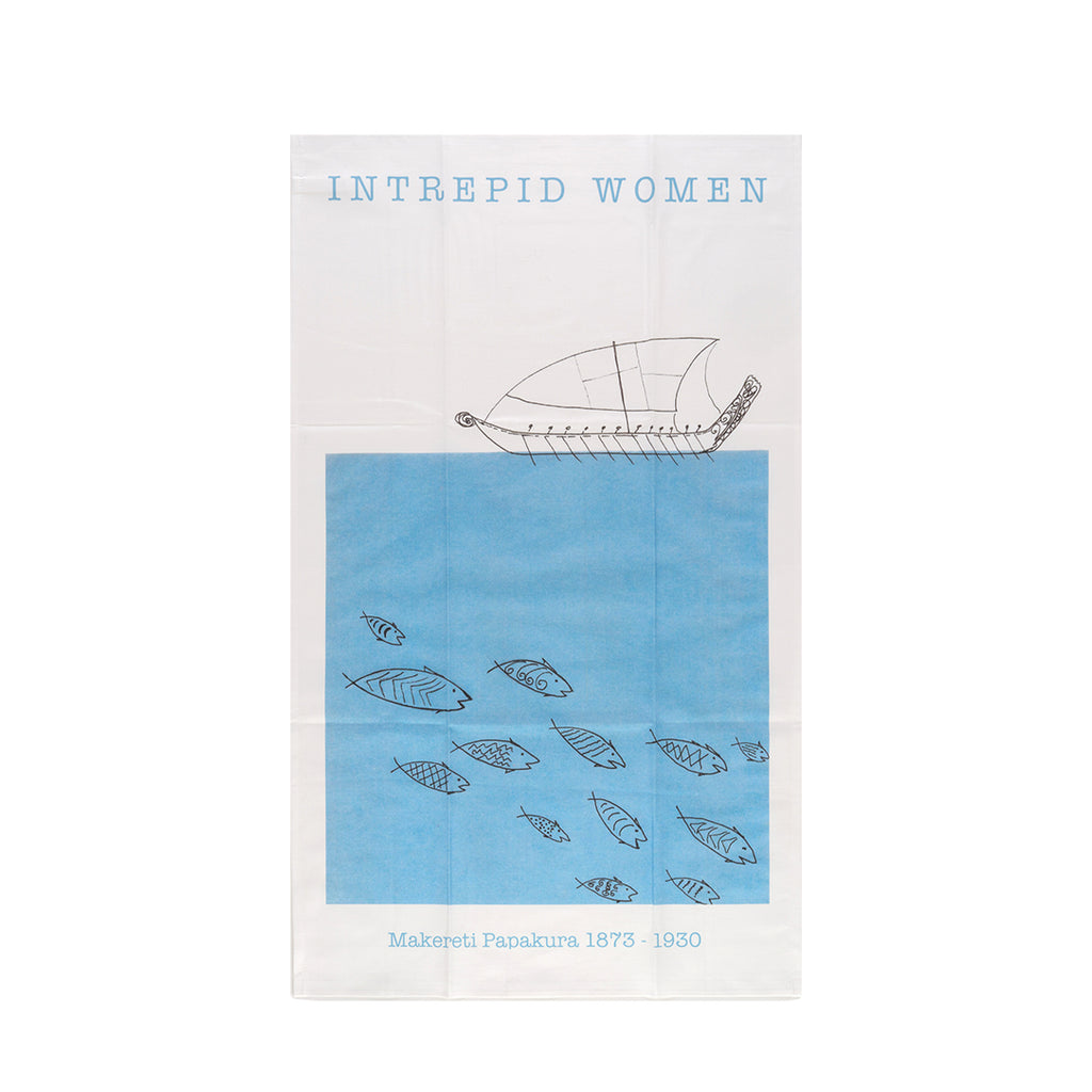 Makereti Papakura tea towel white base with blue square with swimming fish and a boat on the top of the square