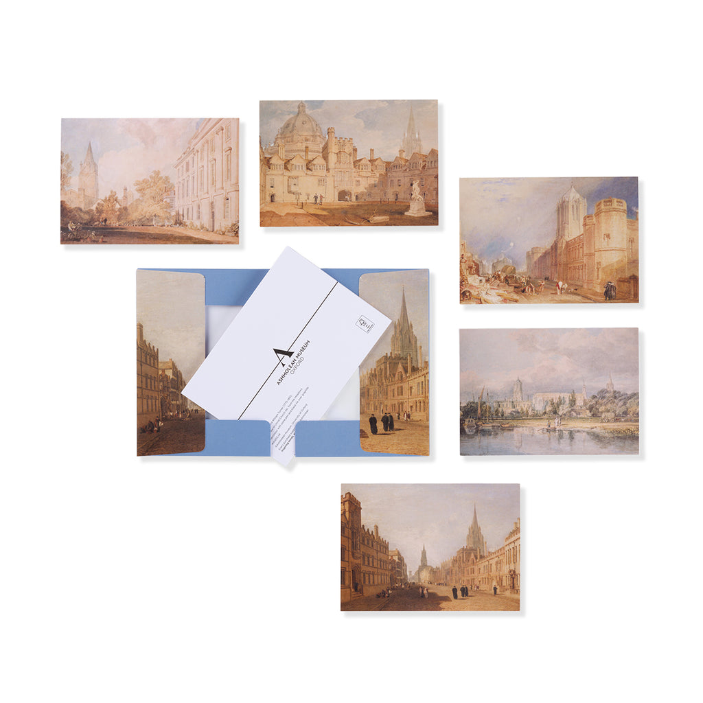 Set of postcards with Turner's Oxford cityscape illustrations and an envelope on a white background