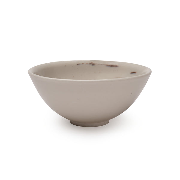 White porcelain dish with hints of black brushstroke design in interior.