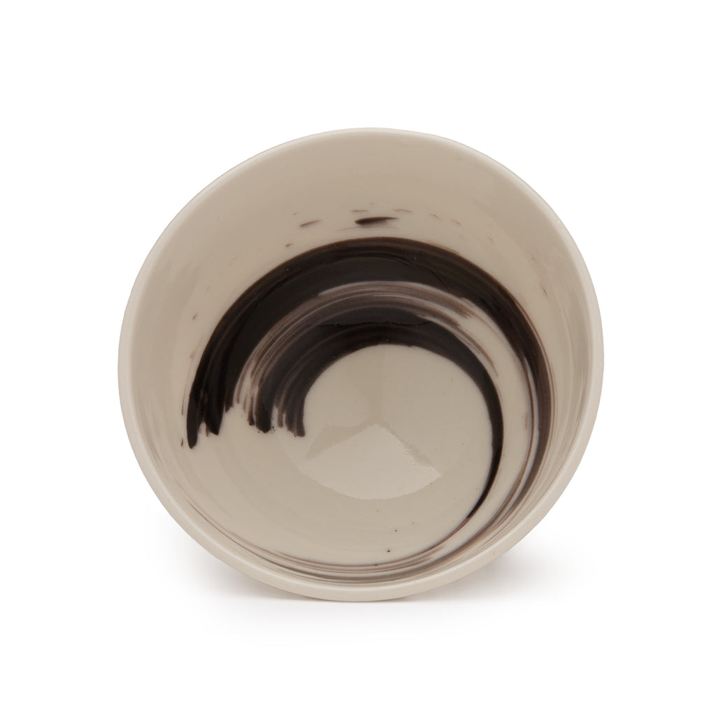 Upright white porcelain bowl with black brushstroke design