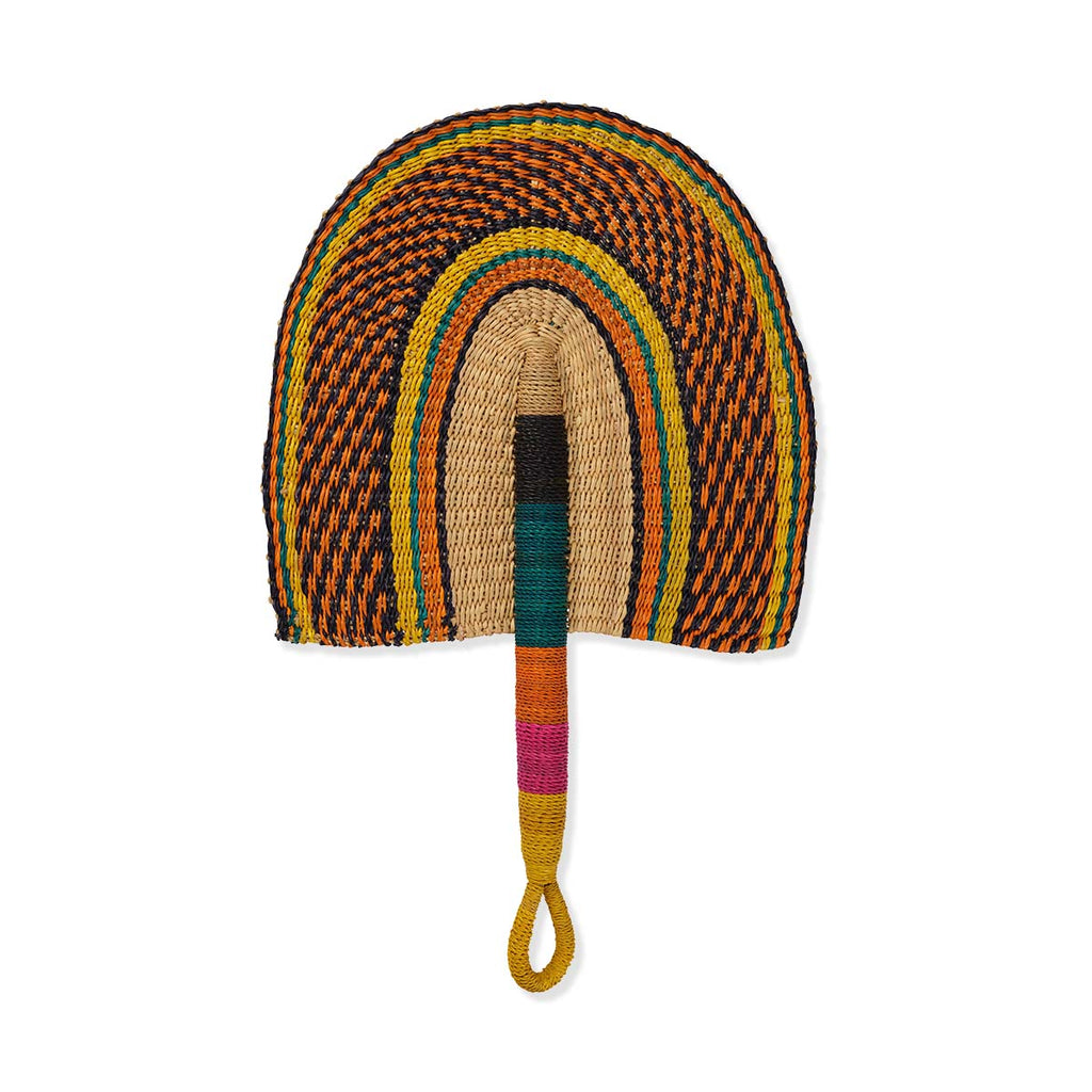 Multi-coloured woven hand fan with a handle on a white background