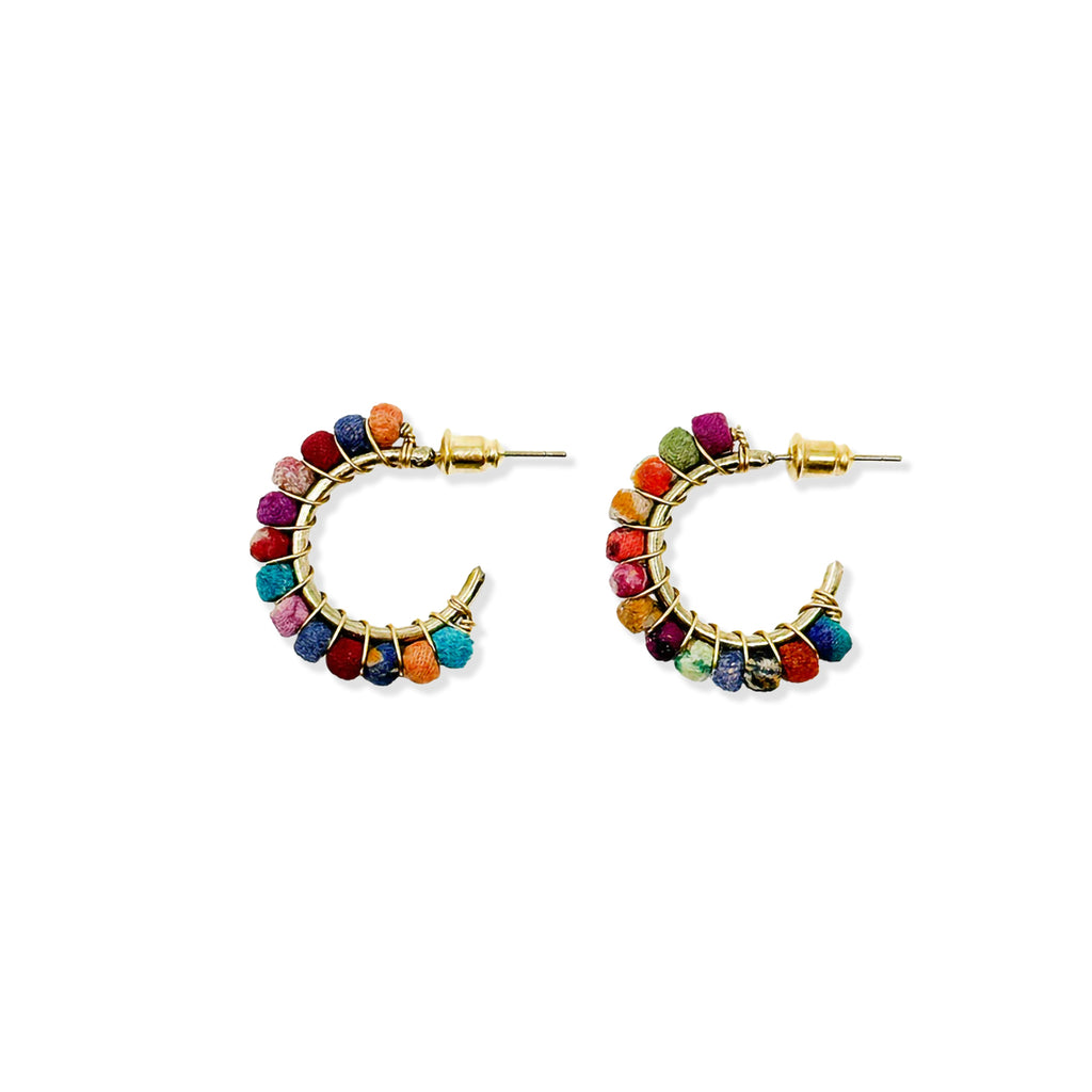 Colourful recycled earrings with kantha fabric and golden metal stud posts on a white background.