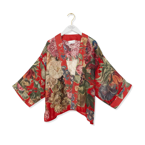 Colourful floral red kimono on a white background